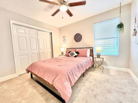 Relax and recharge in this tranquil bedroom, equipped with a plush bed and calming atmosphere