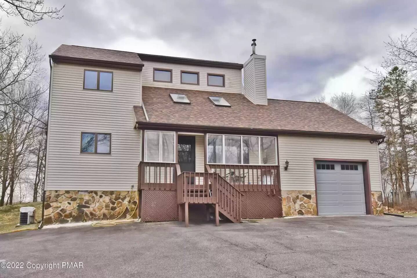 The front of the house is very grand and looks just as big as it is on the inside. Plenty of space plenty of room plenty of parking.