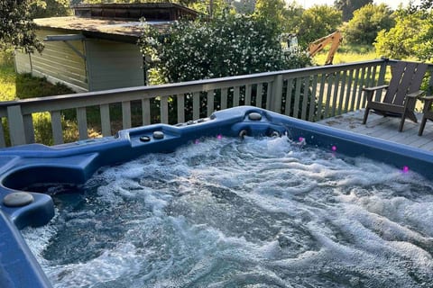 Inviting Jacuzzi spa - 99+ jets, seats 4 to 6.