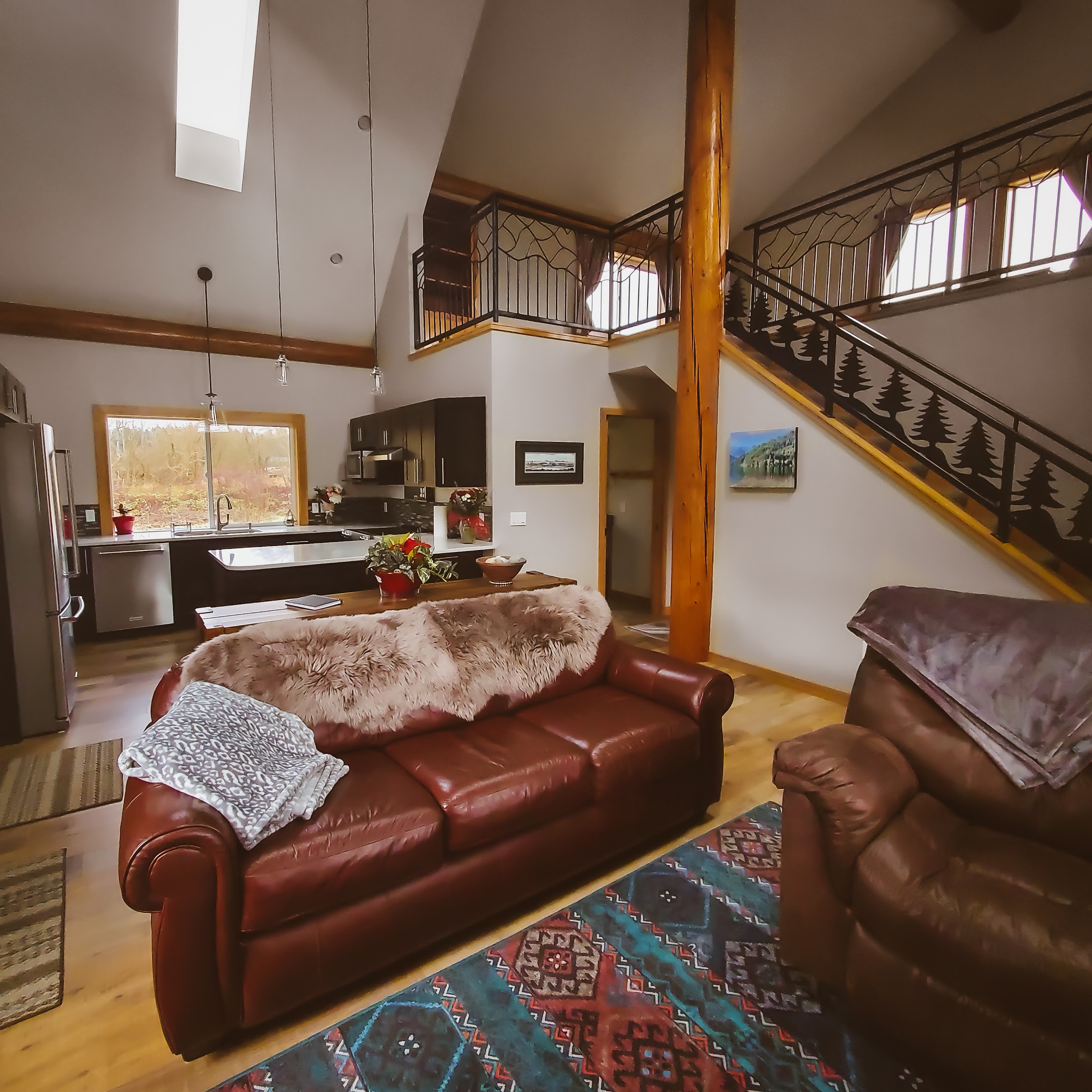 An open, inviting living space with soaring ceilings, custom details and plenty of room to relax.