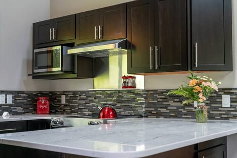 A spacious, well-equipped kitchen makes it easy to cook and enjoy meals together.