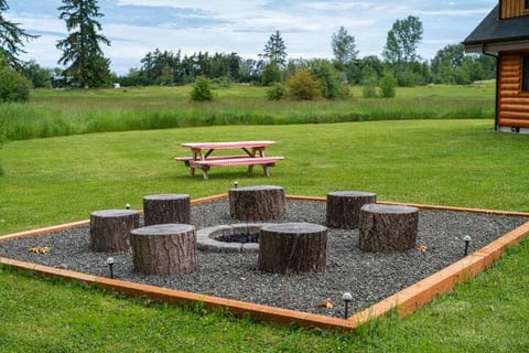 Gather around the fire pit, enjoy a meal outdoors and take in the peaceful meadow setting.