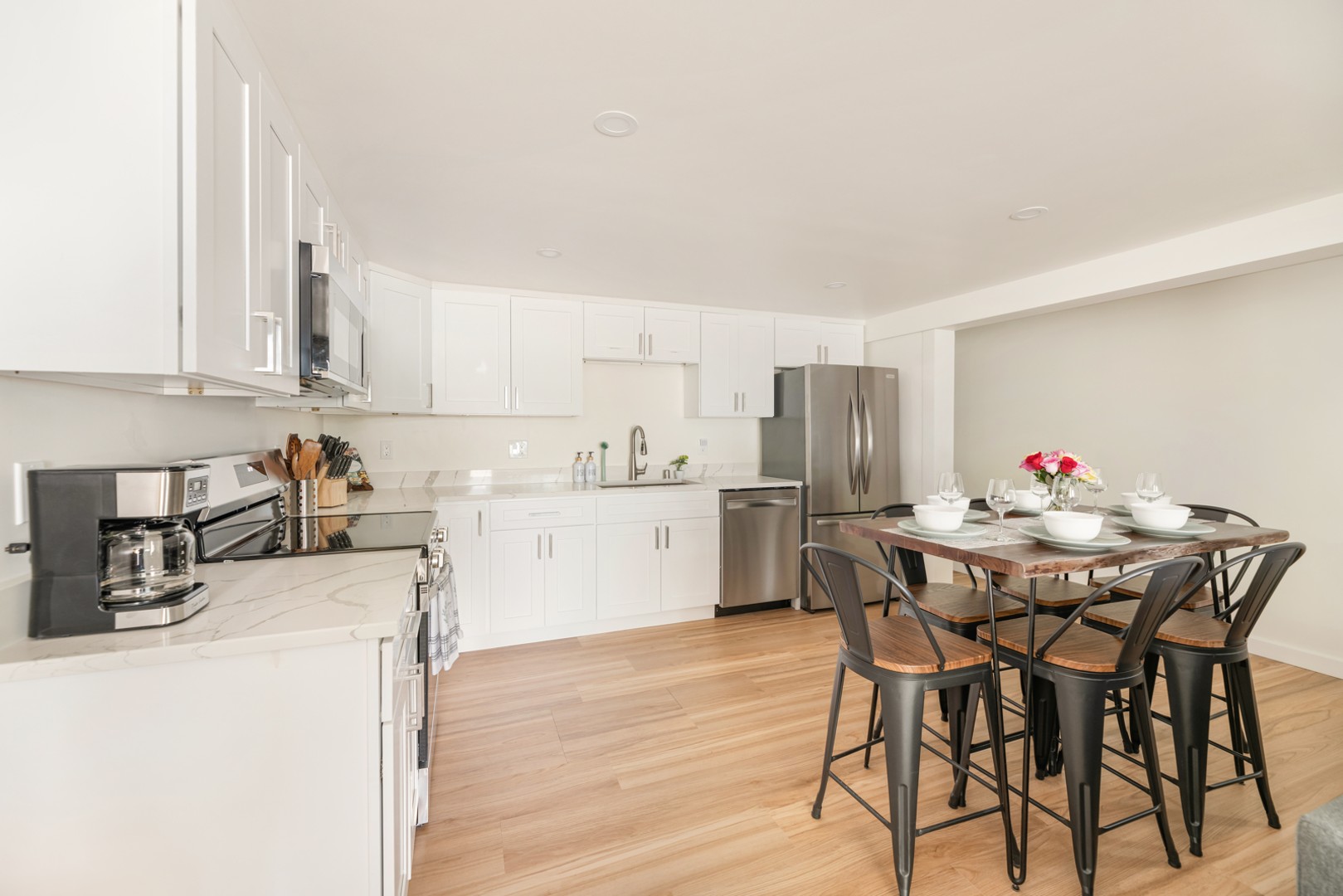 Lower level kitchen and dining area, providing a comfortable space for cooking and enjoying meals together