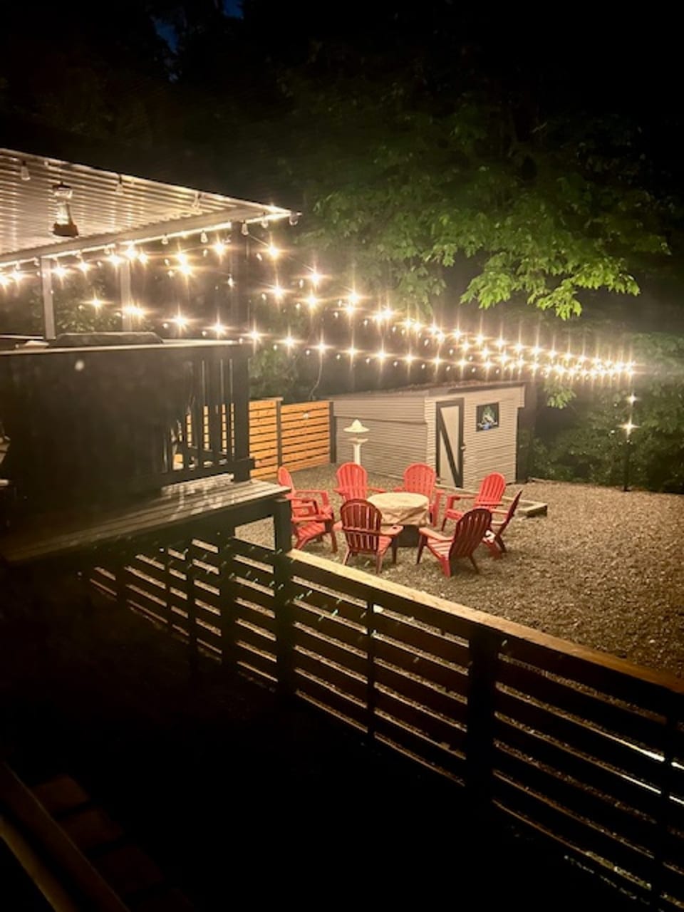 Backyard vibes are strong here! String lights set the perfect mood for evening hangs, with a cozy fire pit and super comfy seating for 8.  Fire up the BBQ, play your favorite games, and kick back under the stars