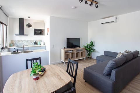 Modern condo with AC and private balcony