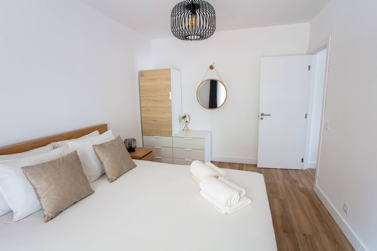 Modern condo with AC and private balcony