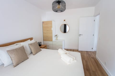 Modern condo with AC and private balcony