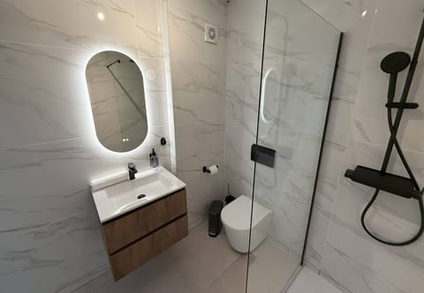 Modern condo with AC and private balcony
