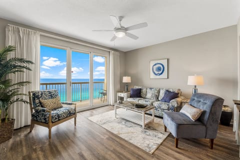 Living room with a queen sleeper sofa, flat-screen smart TV, and stunning views.