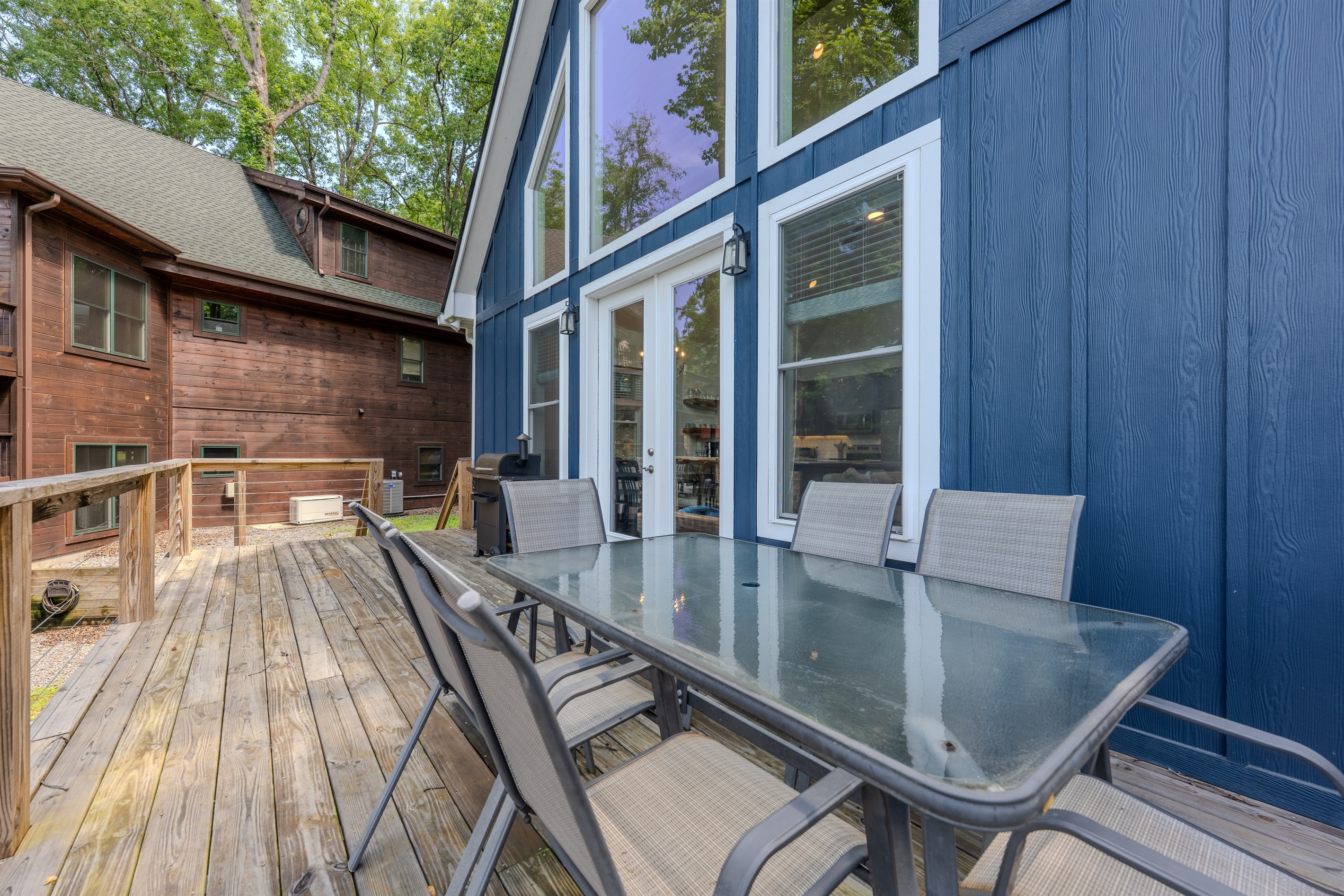 Main level- Deck with lake views, smoker, and outdoor dining Main level- Deck with lake views, smoker, and outdoor dining - Lakey McLakehouse - Robbinsville