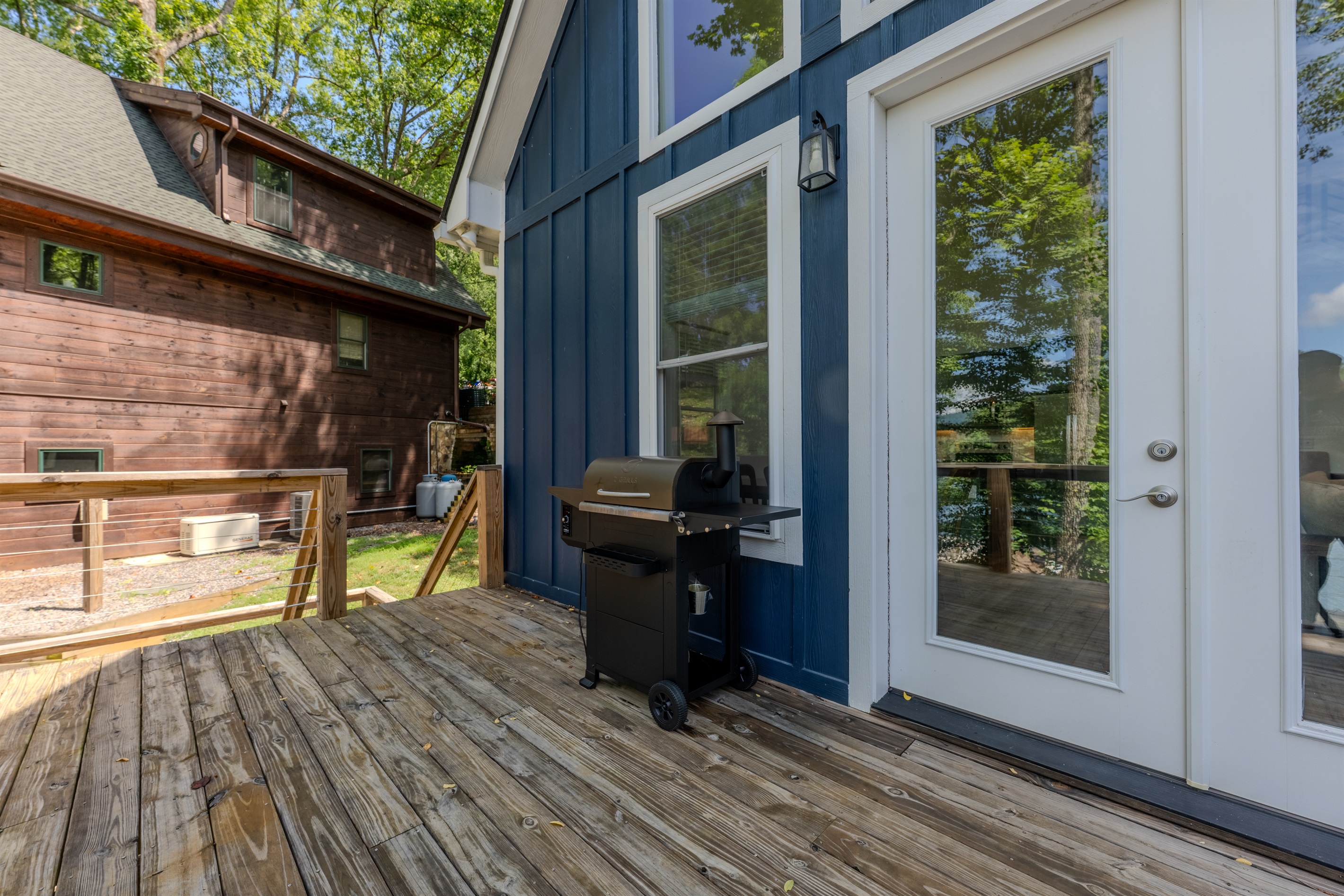 Main level- Deck with lake views, smoker, and outdoor dining Main level- Deck with lake views, smoker, and outdoor dining - Lakey McLakehouse - Robbinsville
