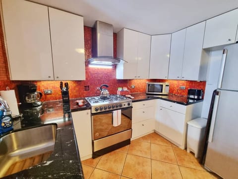 Fully stocked open Kitchen with all the appliances to prepare delicious meals!