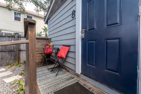 Step outside to your private outdoor deck, complete with a dining table and chairs—perfect for morning coffee or alfresco meals in the fresh air.