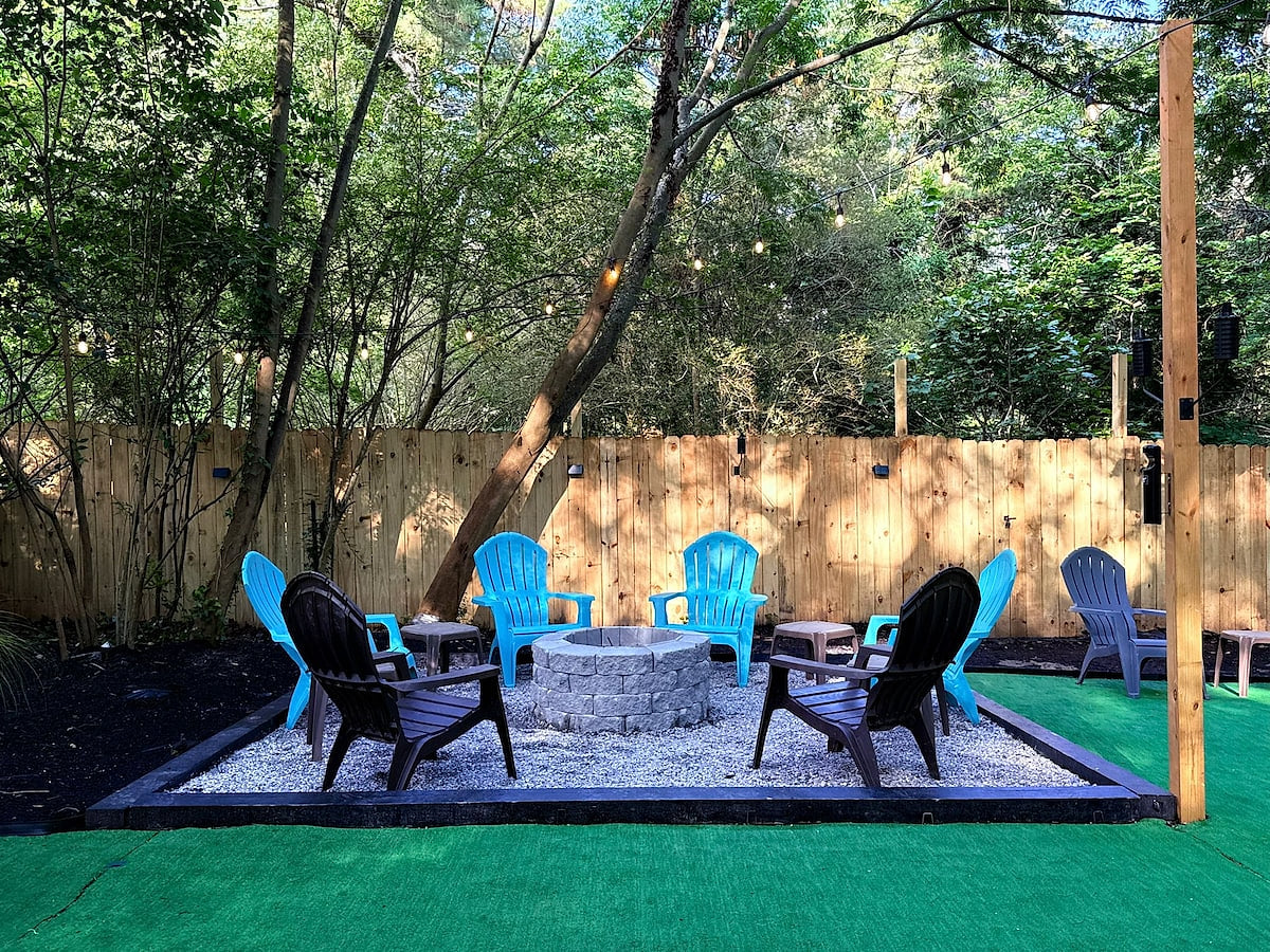 Light It Up, Lounge It Out
This fire pit scene was made for deep convos, toasted marshmallows, & late-night laughs under the string lights. Adirondack seating, gravel base, and backyard glow, just bring your crew and firewood.
(Firewood not included)