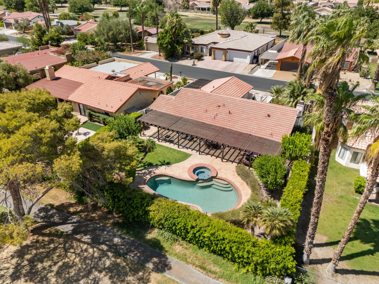 Casa Palmera, Palm-Lined Spanish Oasis w/ Pool, Spa, BBQ & Games near Coachella, Indio CA by Rather Be Properties