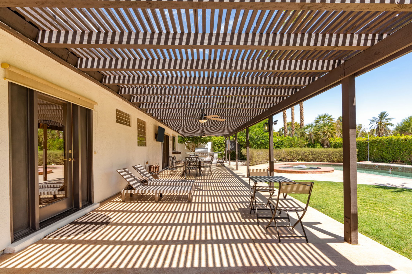 Casa Palmera, Palm-Lined Spanish Oasis w/ Pool, Spa, BBQ & Games near Coachella, Indio CA by Rather Be Properties