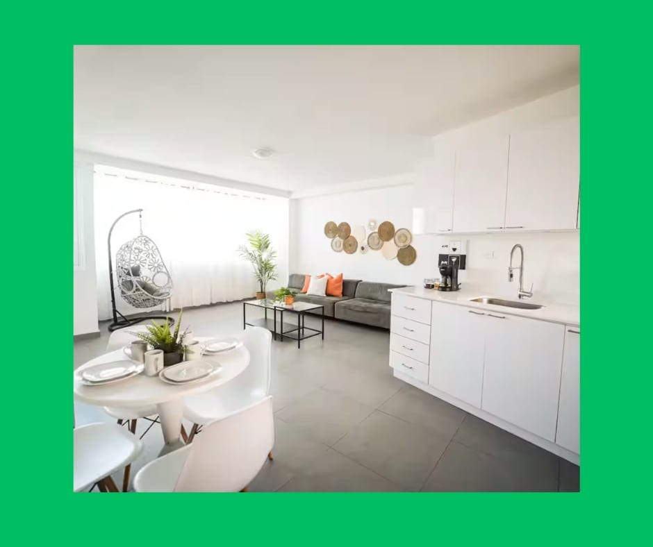 Great, open and spacious living room with Smart TV and large, comfy sofa. 