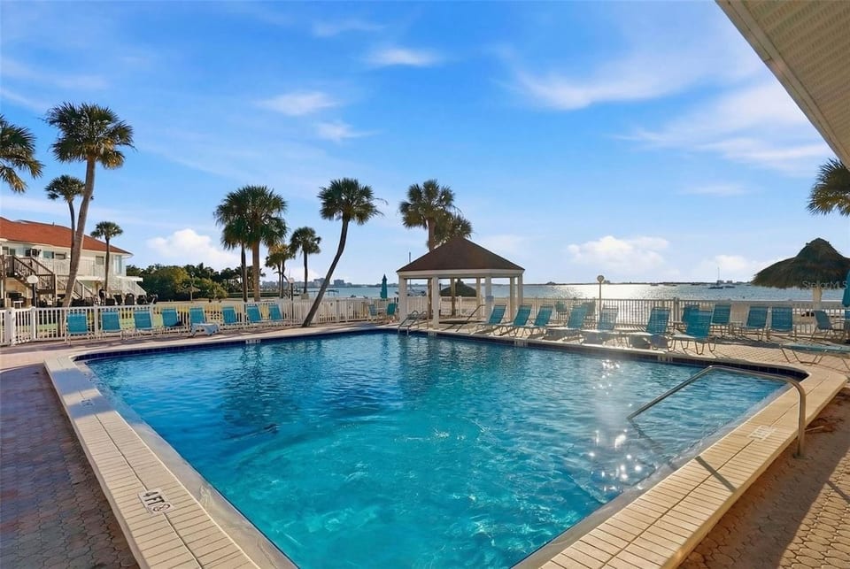 Waterfront Key West–style community, Stunning water views, glowing sunsets, and a laid-back island vibe ✨