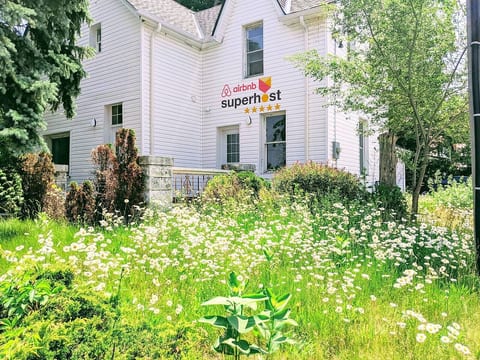 Charming home surrounded by blooming flowers