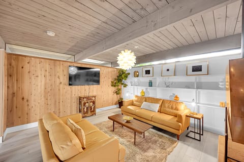 Living room with wood burning fireplace