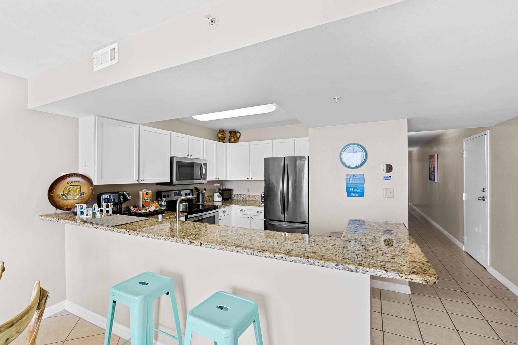 Kitchen with stainless appliances - Pelican Beach 1710 - Destin