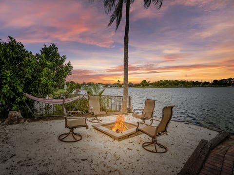 Relax by the water and enjoy a fire or nap in the hammock