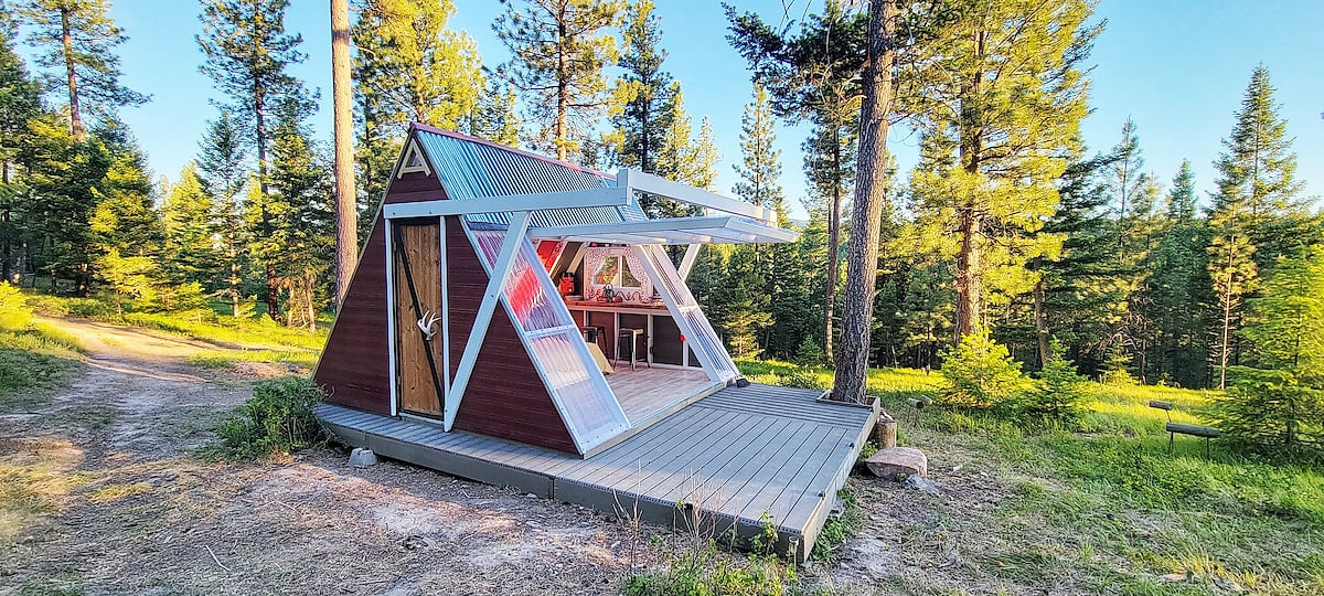 Bring your furry best friend and enjoy this A-frame cabin in the woods with a one of a kind translucent door-wall, which is operated with a push of a button. 