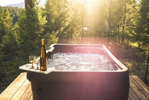 Sign up for and enjoy your own romantic time in the cozy 2 seater shared hot tub under the Big Sky country stars.