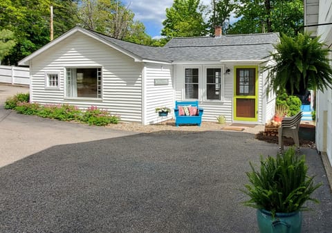 Cottage entry. Garage on property is used for storage by owners. 