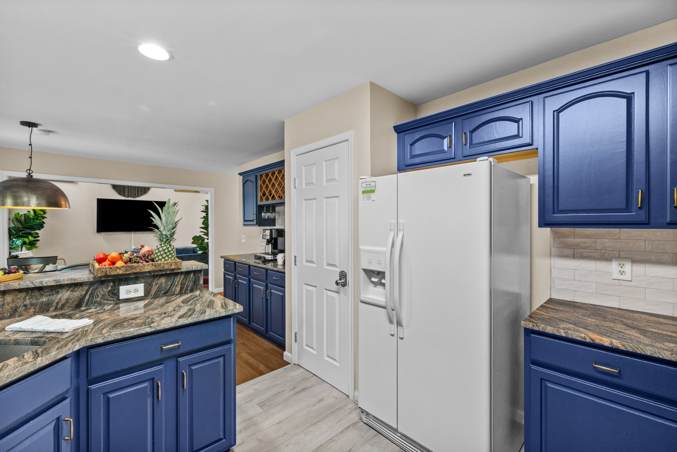 Everything you need, right where you need it. Complete with our modern fridge + water dispenser combo.