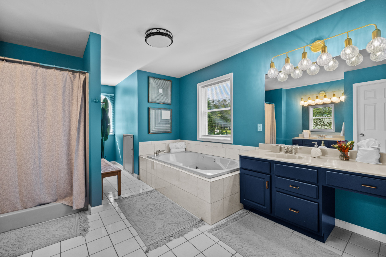 Enjoy the luxury of a standup shower plus a separate whirlpool bath in the primary bedroom ensuite.