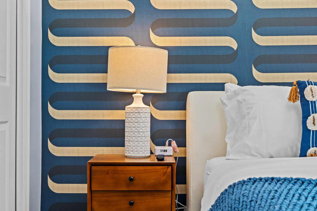 Loving the wow factor from that wall design and table lamp!