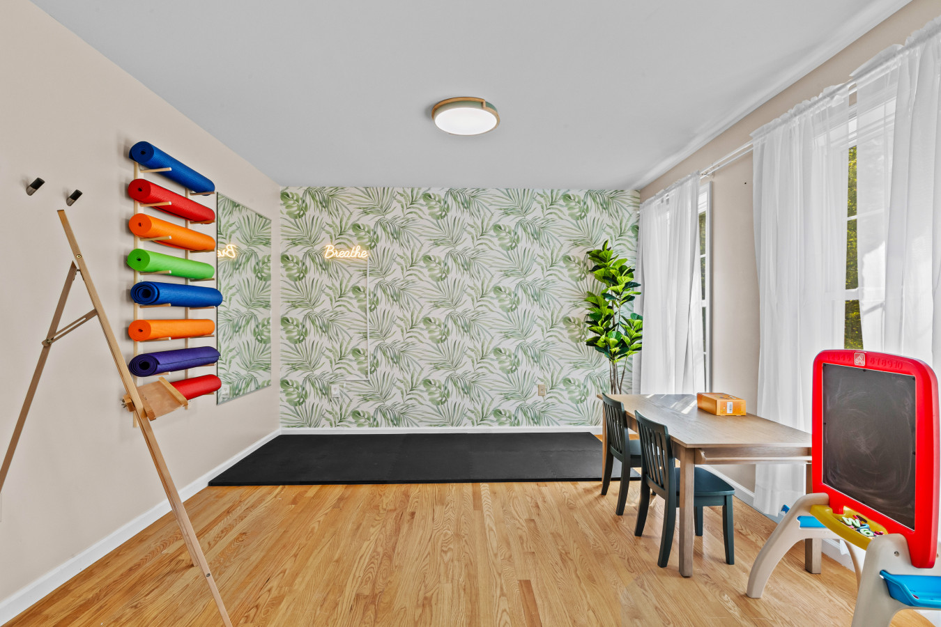 Find your zen with yoga mats ready, plus a creative corner for kids with a multifunctional table and easel.