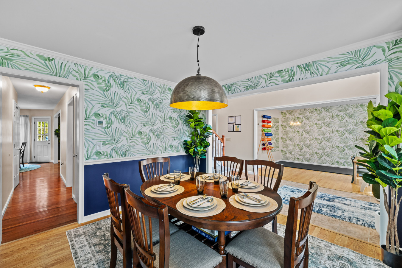 Spacious dining area with a table that comfortably seats six or more.