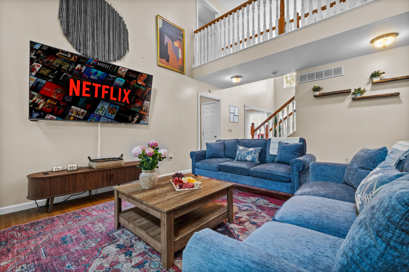 Enjoy the airy, high-ceiling living room.