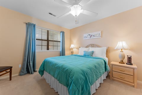 Cozy and comfortable bed in the guest bedroom for a peaceful night’s sleep.
