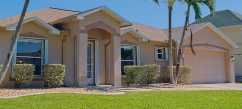 Exterior house image with swaying palms!