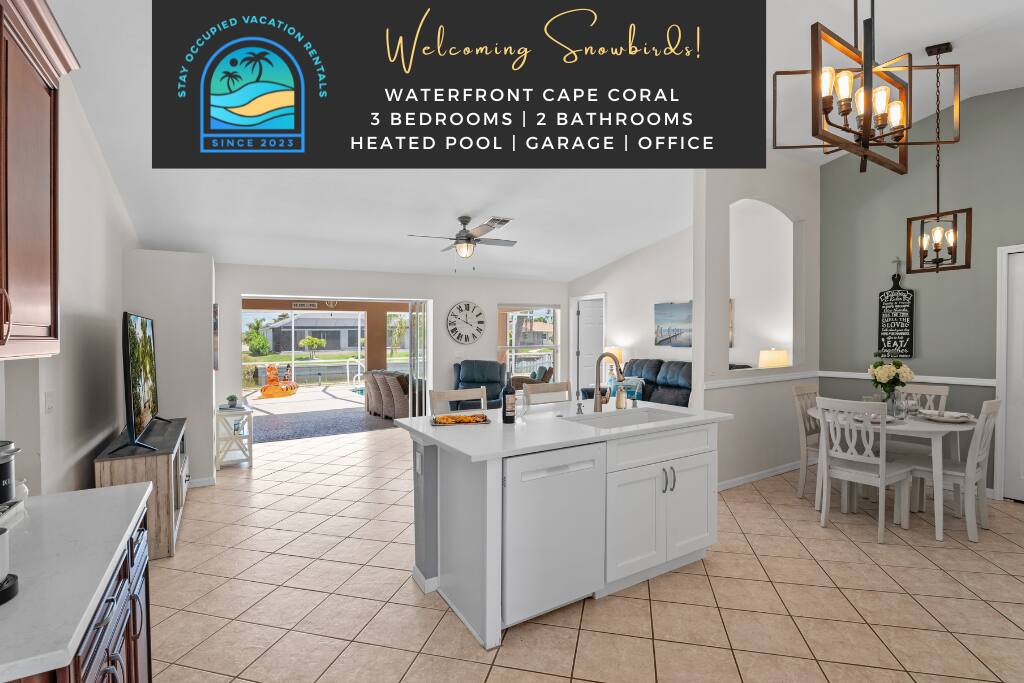 Stay Occupied Vacation Rentals - Now Booking Fall/Winter 2025! Waterfront Cape Coral 3 beds and two bathrooms heated pool with garage and office nook