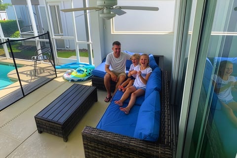 Relax in your covered lanai with safety pool gate