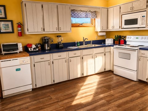 Sharp knives, spices, utensils, oh, my! You can cook as much or as little as you like here (we won't judge) and some of our guests have made fabulous family feasts here. The fully stocked kitchen offers everything you'll need for cozy meals at home