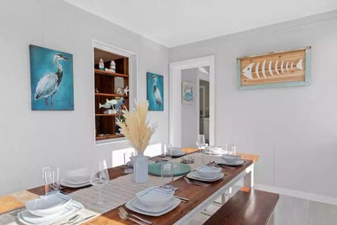 Dedicated dining room with plenty of seating for 8. Can also be a great space for board and/or card games! (High chair in the laundry room for the little ones if you need it too)