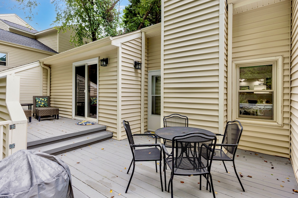 Large back deck with charcoal grill (bring your own charcoal). Two seating areas.