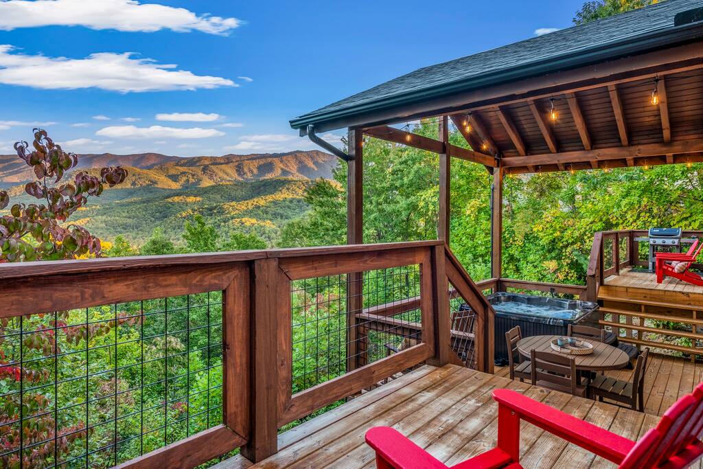 3 tiered deck, 4 polywood adirondack chairs, 2 polywood rockers, new propane grill, and an outdoor dining table with chairs (also polywood)