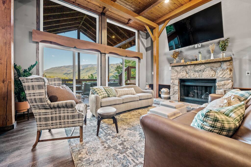 Living room. Easy access to the deck and beautiful views through the large windows