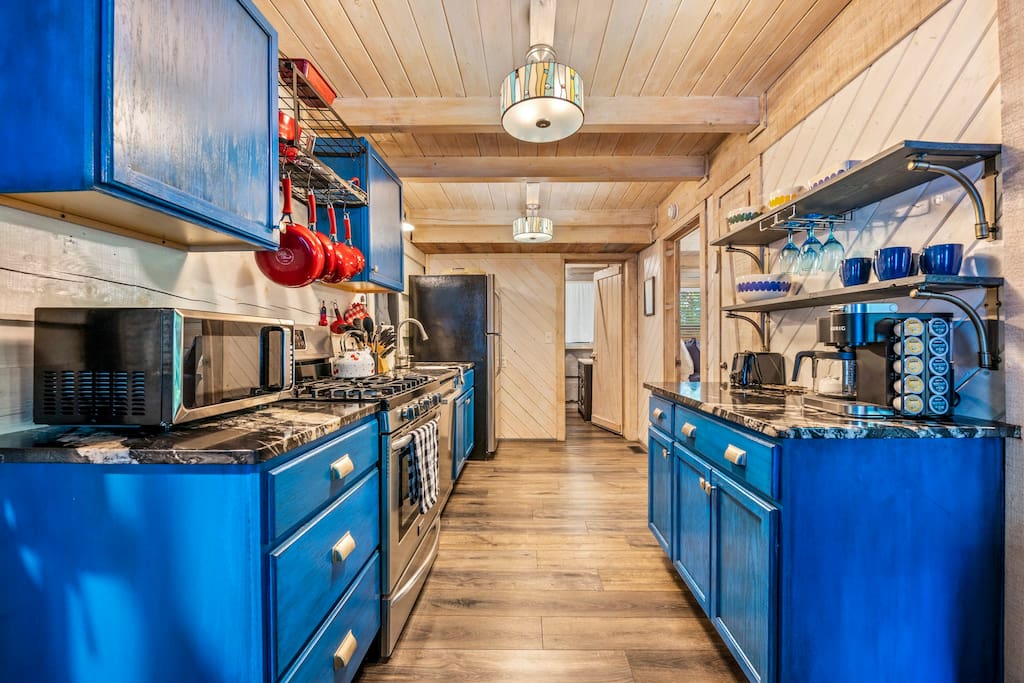 Bluey! We tried to think of everything one would need to cook a nice meal for friends and family. The pantry is right behind the kitchen counter to the right. 