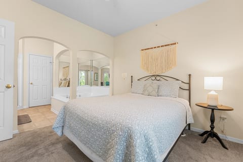 Spacious primary suite with direct access to the large ensuite bath and walk-in closet.