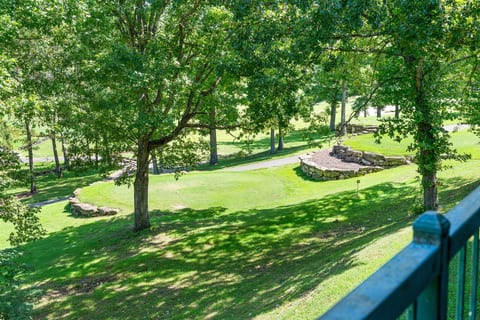 Another look from the deck, with the green space and resort setting just beyond the railing.