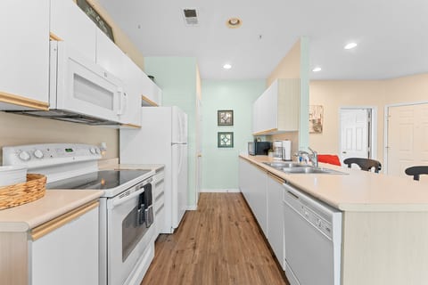 Extra kitchen angle for guests who want a fuller sense of the cooking space before booking.