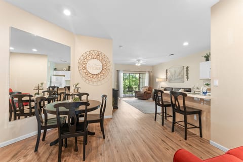 Open dining, breakfast bar, and living space make it easy for everyone to gather without feeling crowded.