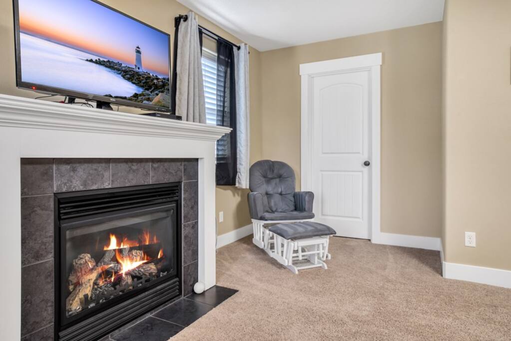 Master bedroom with rocking chair 
